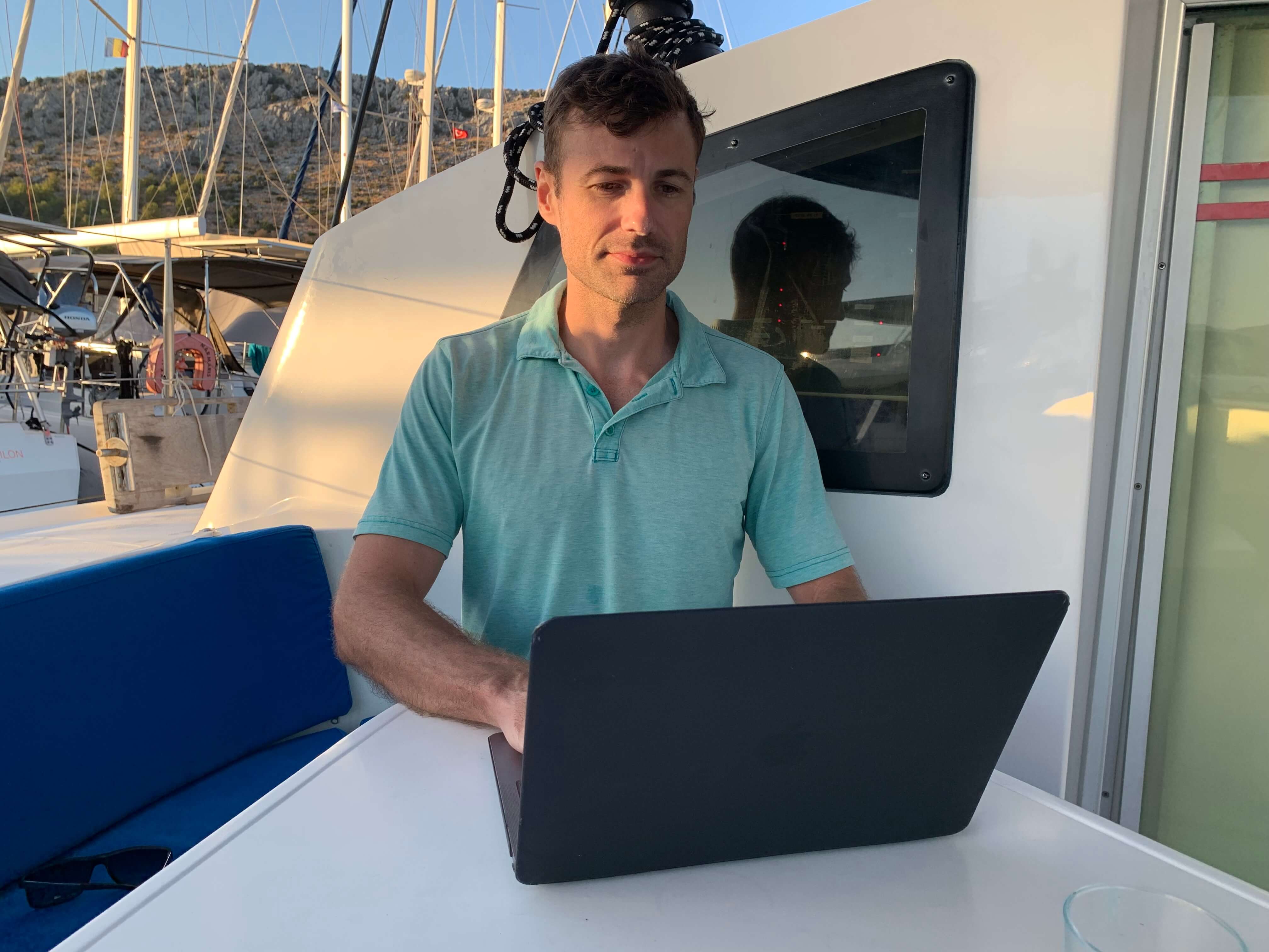 Chase working from his boat office